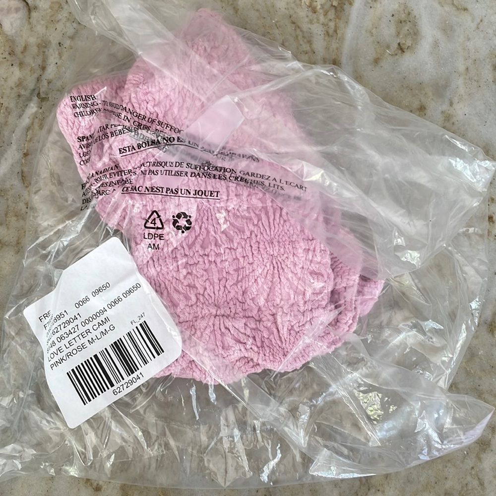 Free people love letter cami in pink.